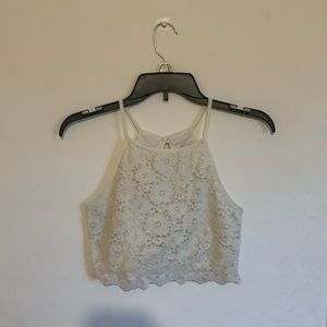 Small cream laced crop top warn a few times good condition.